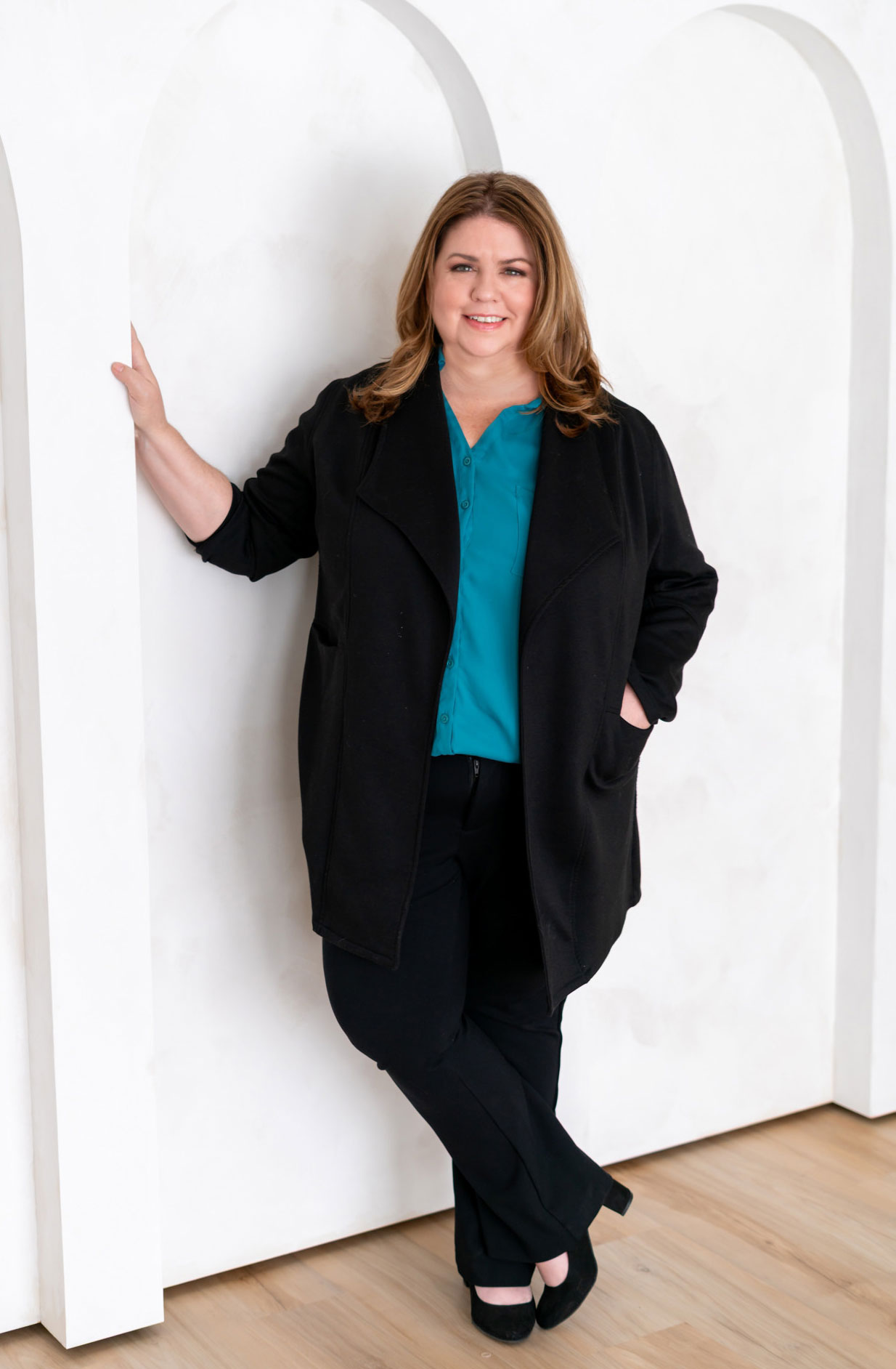 shannon ackley standing in the archway